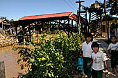 Inle Lake Myanmar. All the buildings are constructed on piles. Residents travel around by canoe, but there are also bamboo walkways and bridges over the canals, monasteries and stupas. 